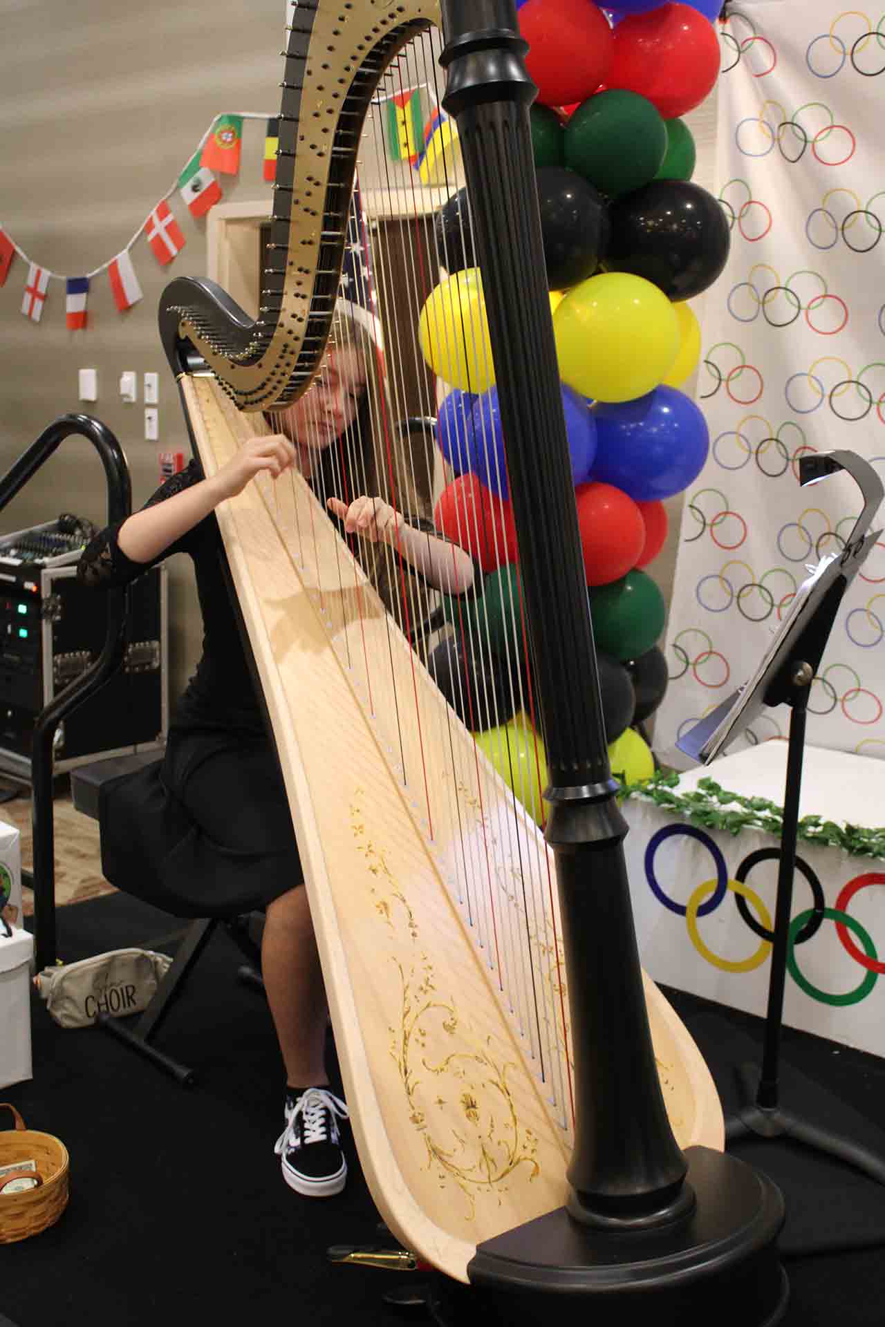 2024_Convention_Friday_Night_Entertainment_Alexie_Weaver_Playing_Harp_1