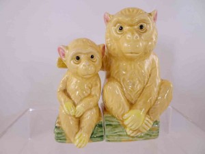 Monkeys salt and pepper shakers from series entitled Norleans Animals - One with Arm Over the Other