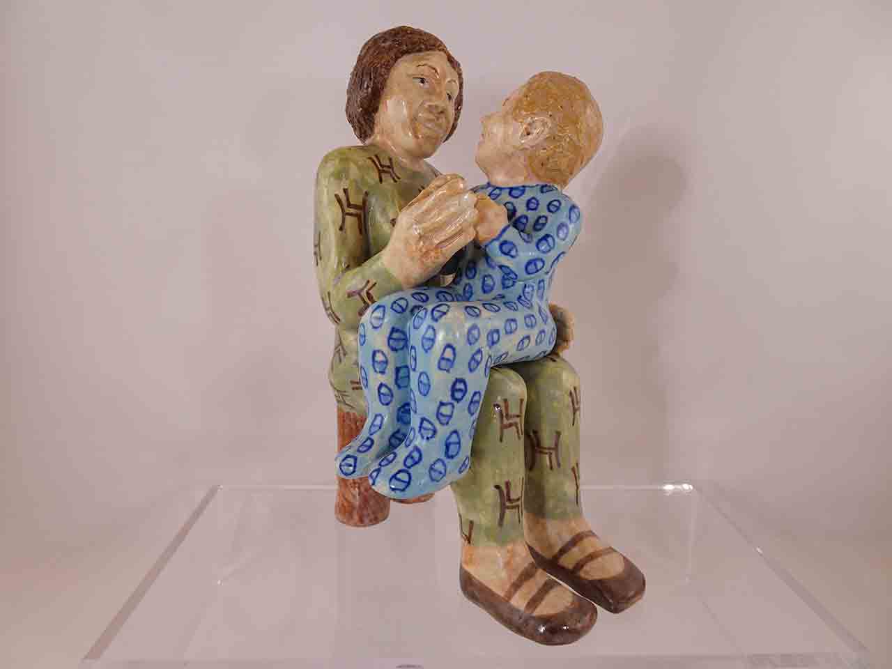 Child sitting on mother's lap salt and pepper shakers by Marilyn Andrews