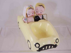 "Just Married" - bride and groom in large yellow car salt and pepper shakers