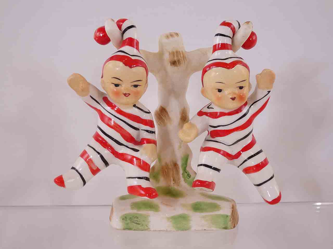 Babies hanging in pajamas salt and pepper shakers