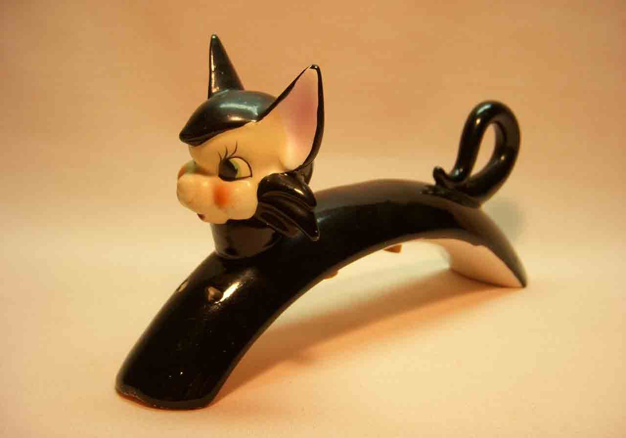 Long arched black cat one piece salt and pepper shaker