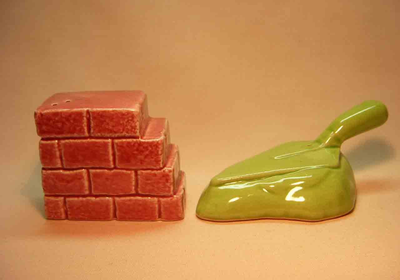 Go with brick mason's brick wall with tool salt and pepper shaker