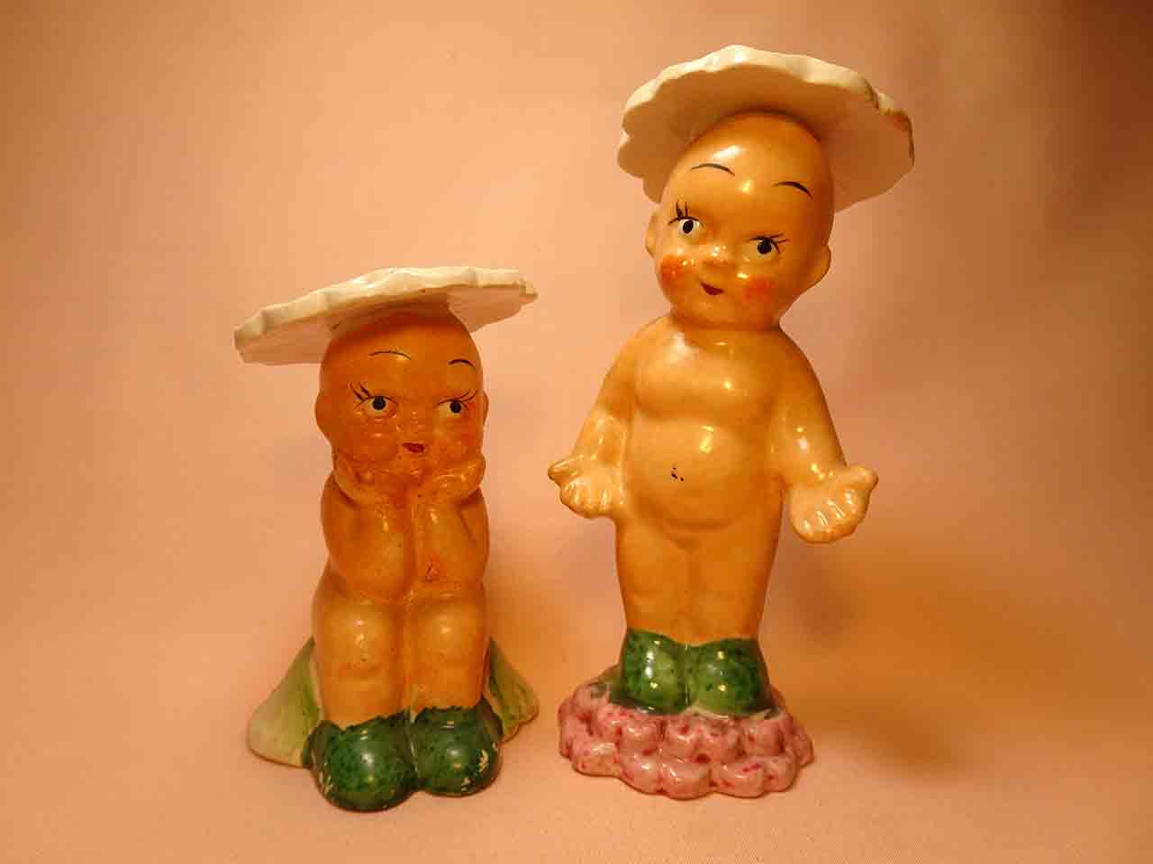 Babies wearing flower hats salt and pepper shakers series