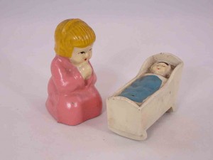 Metal little child praying next to baby in cradle salt and pepper shakers