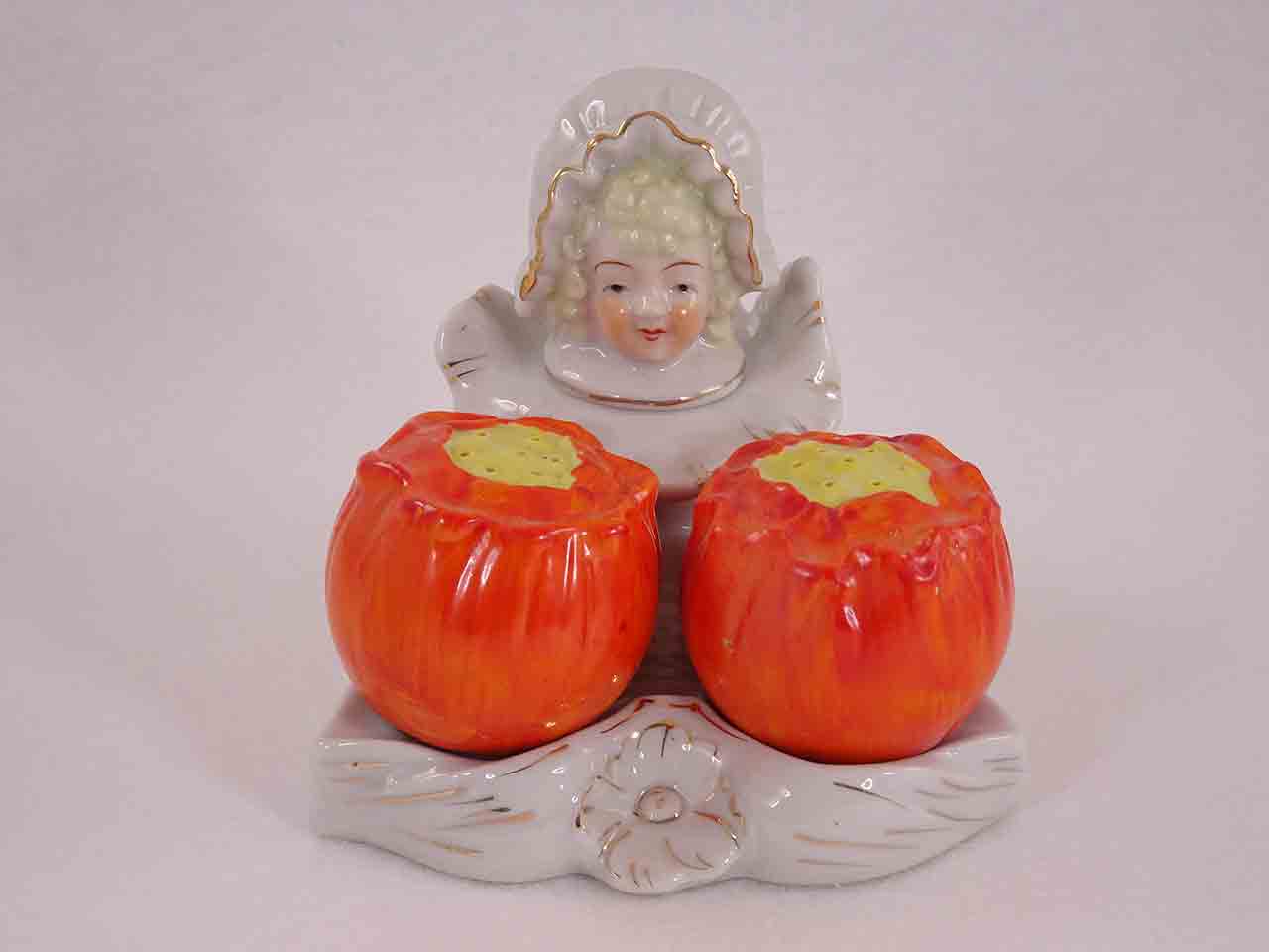 Occupied Japan condiment set and salt and pepper shakers - lady