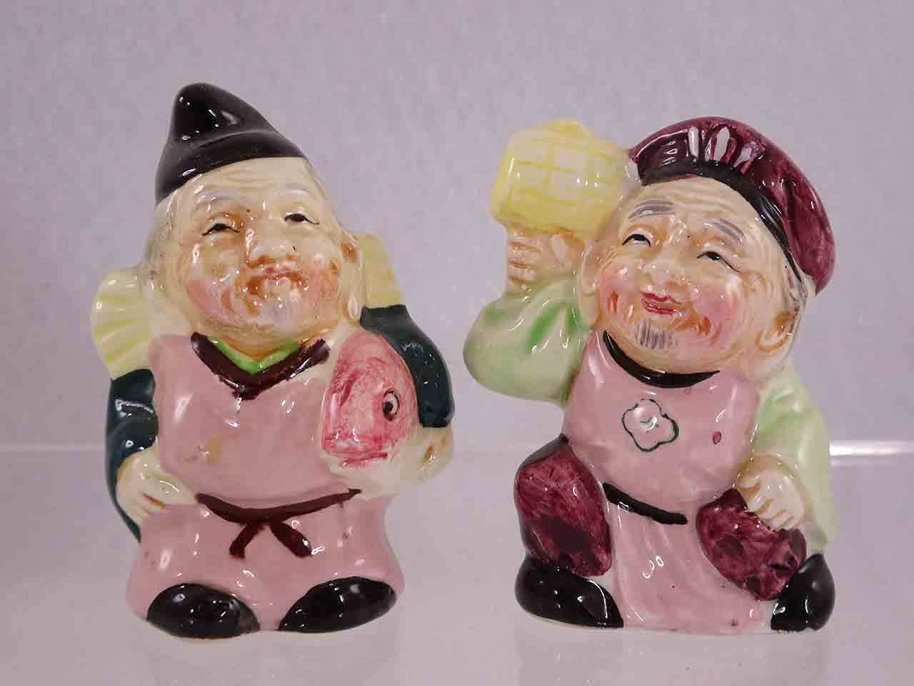 Little Asian people salt and pepper shakers