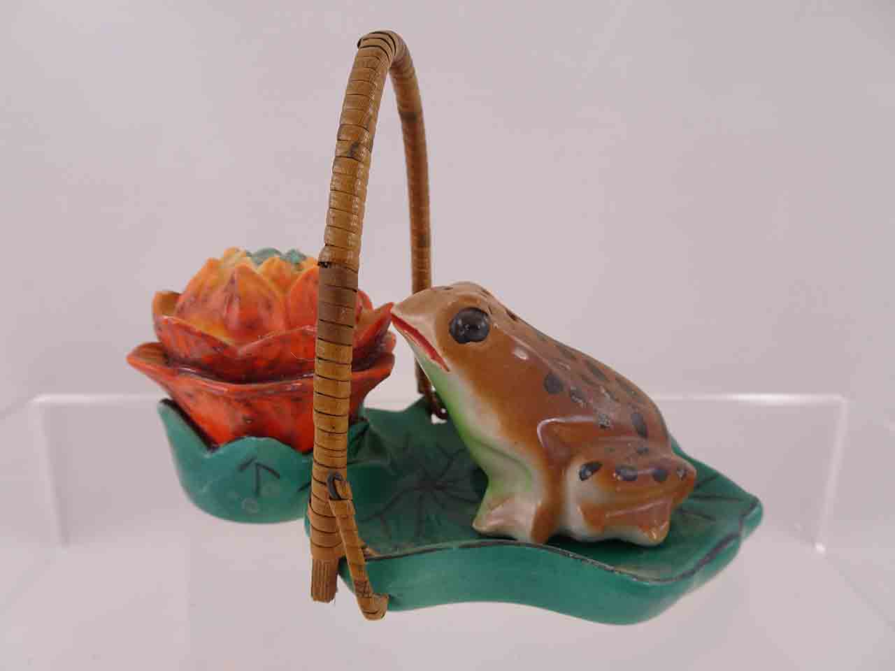 Frog with flower on lily pad with wicker handle salt and pepper shakers