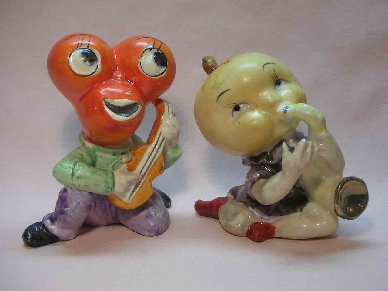 Anthropomorphic cherry and fig guys playing instruments salt and pepper shakers