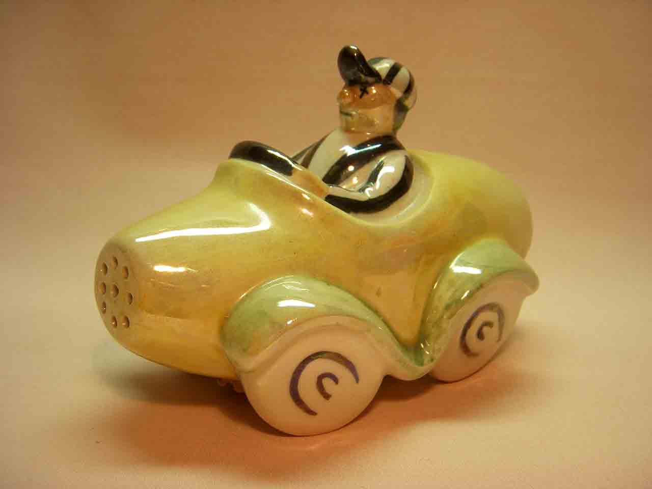 Lusterware man in car one piece salt and pepper shaker