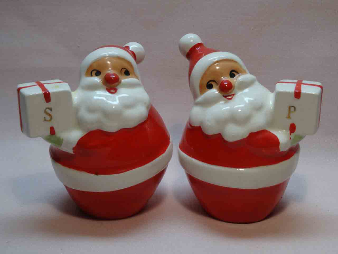 Holt Howard Santa Claus holding presents salt and pepper shakers